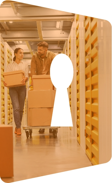 Photo of man and woman sorting out boxes in storage units